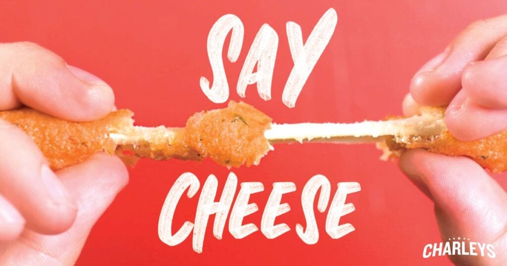 Charleys Cheesesteaks Cheesy mozzarella sticks being pulled apart, with the words "say cheese".
